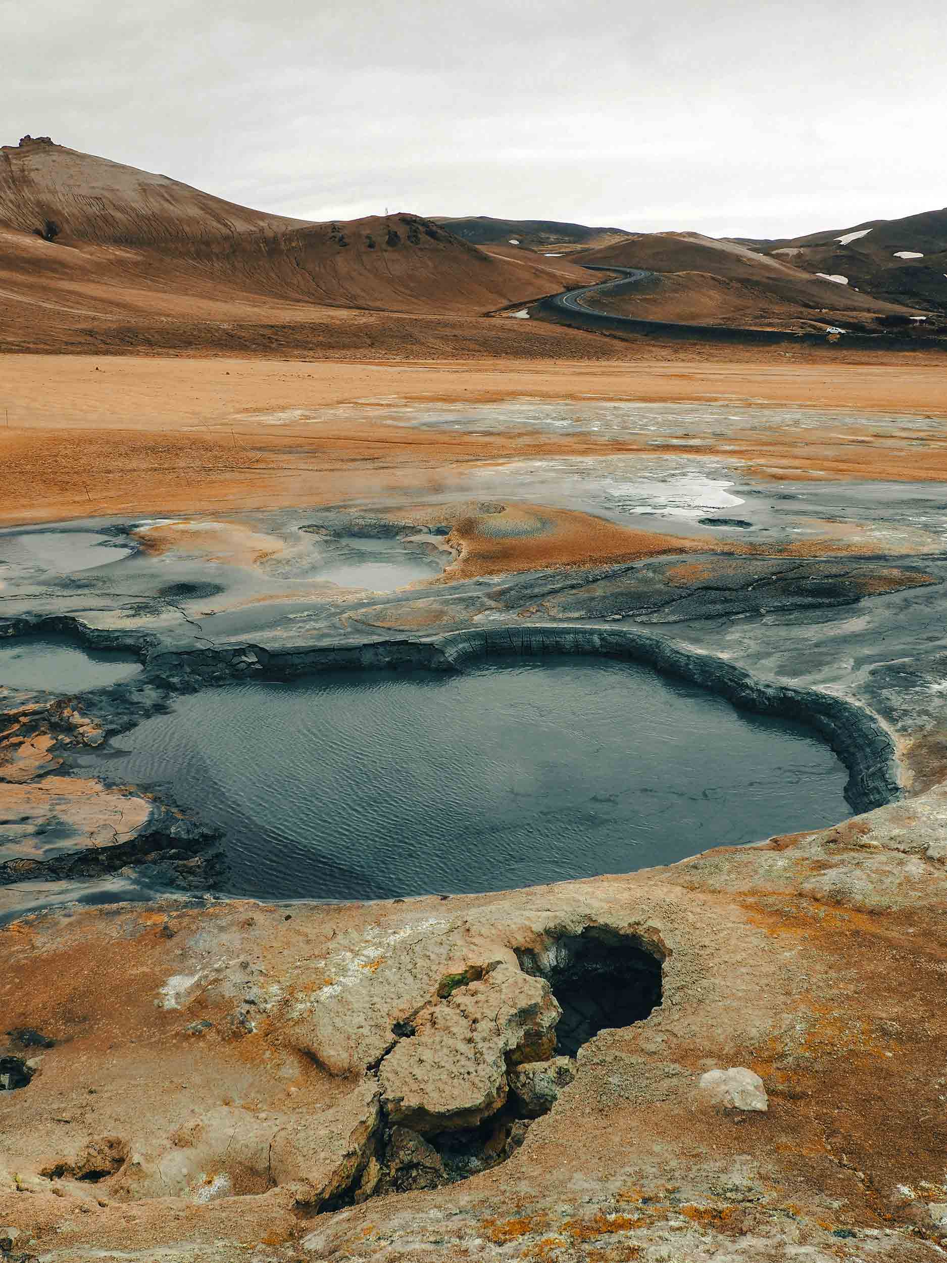 Iceland’s Geothermal Heart – Steam, Earth & Silence Where earth breathes. In Iceland’s geothermal heart, steam rises through rust-colored hills and quiet air. The land feels alive — raw, surreal, and endlessly powerful — a reminder of nature’s untamed rhythm beneath our feet.